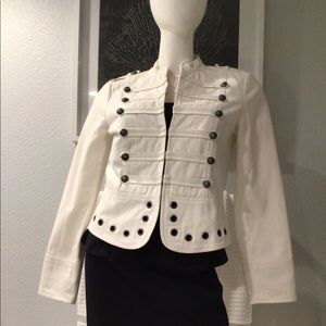 Off-white jacket with military inspired detailing.